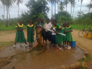 Children pumping water
